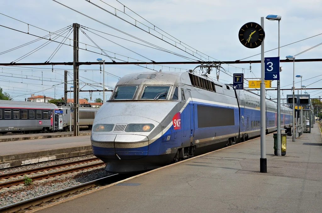 A TGV high-speed train waiting at a platform in Angoulême station, France